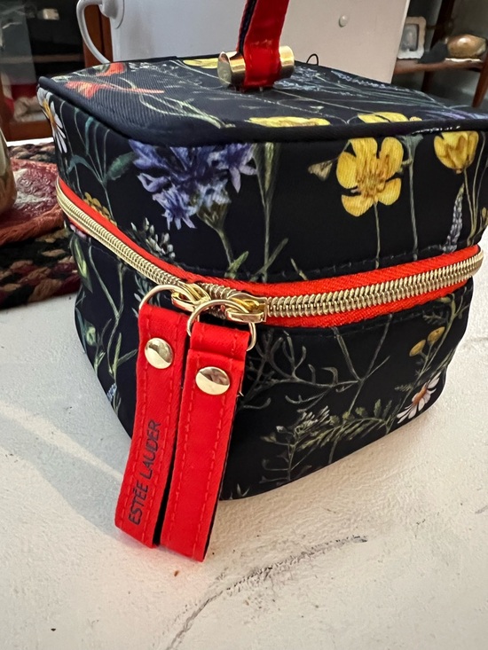 Estee Lauder Handbags - Estee Lauder Black Floral Cosmetic Case with Red Trim and make up included